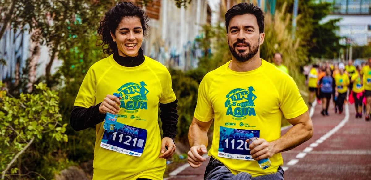 Two athletes participating in a marathon, showing determination and joy.
